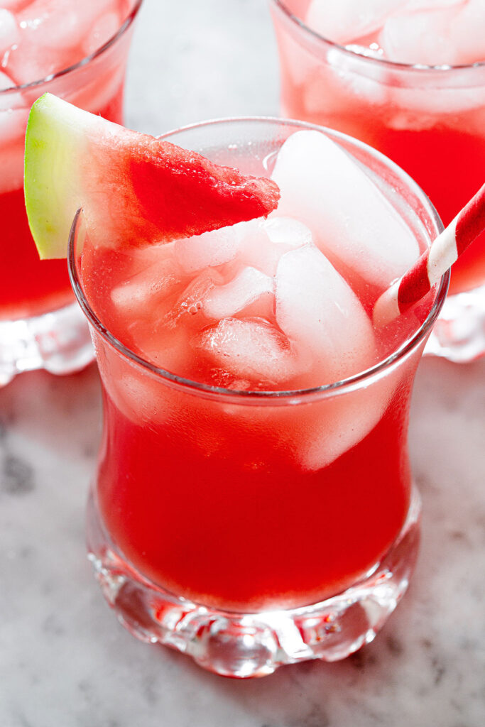 Close-up of agua de sandia in a glass with ice.