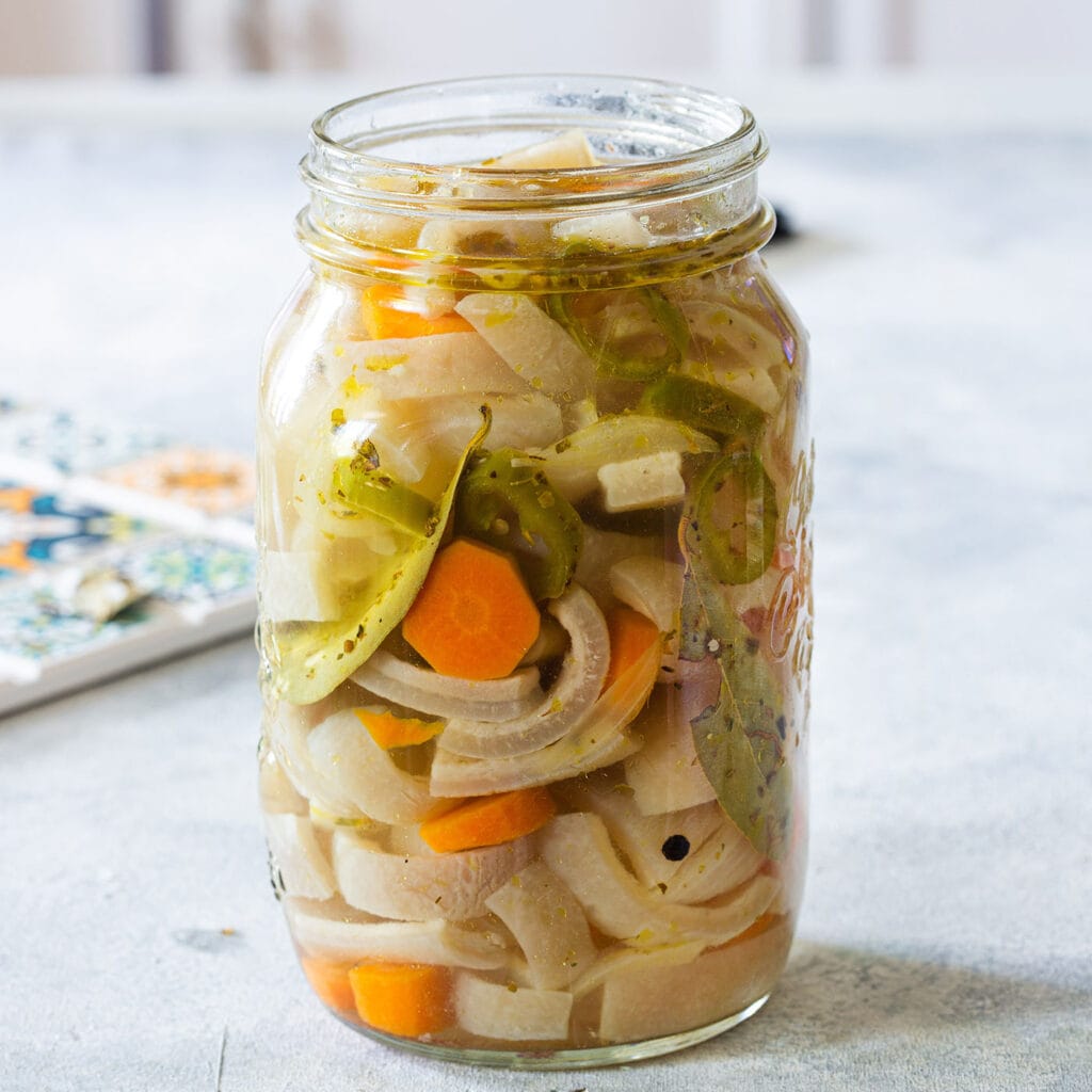 Cueritos recipe for pickled pork skin.