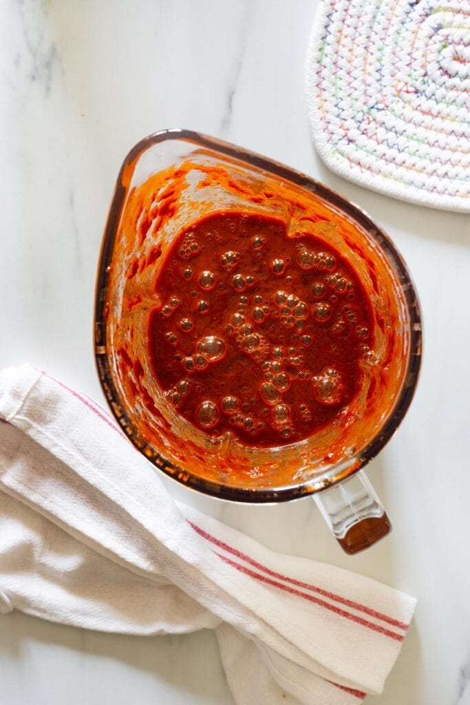 Fully blended red enchilada sauce.