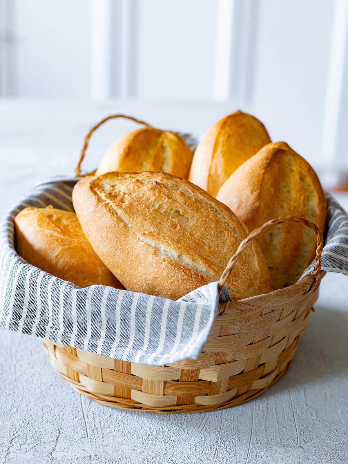 Bolillo bread in a basket.