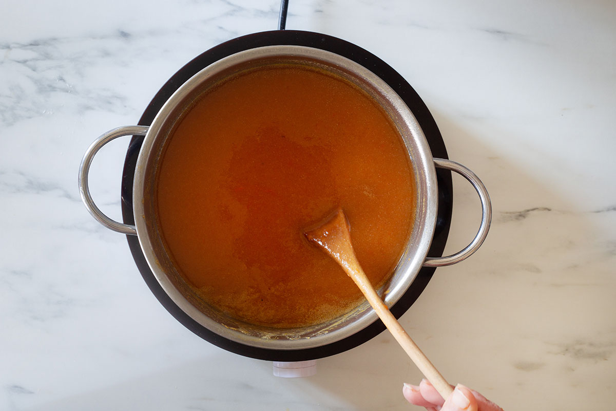 Fully cooked atole de calabaza in a pot.